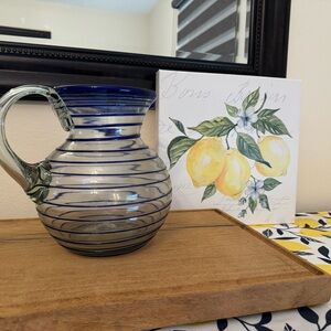 Beautiful Mexican hand blown pitcher.